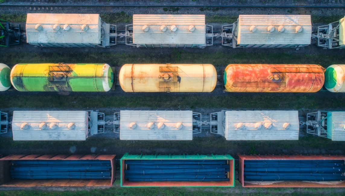 aerial-view-of-railway-wagons-cargo-trains-2021-08-26-17-00-56-utc 1